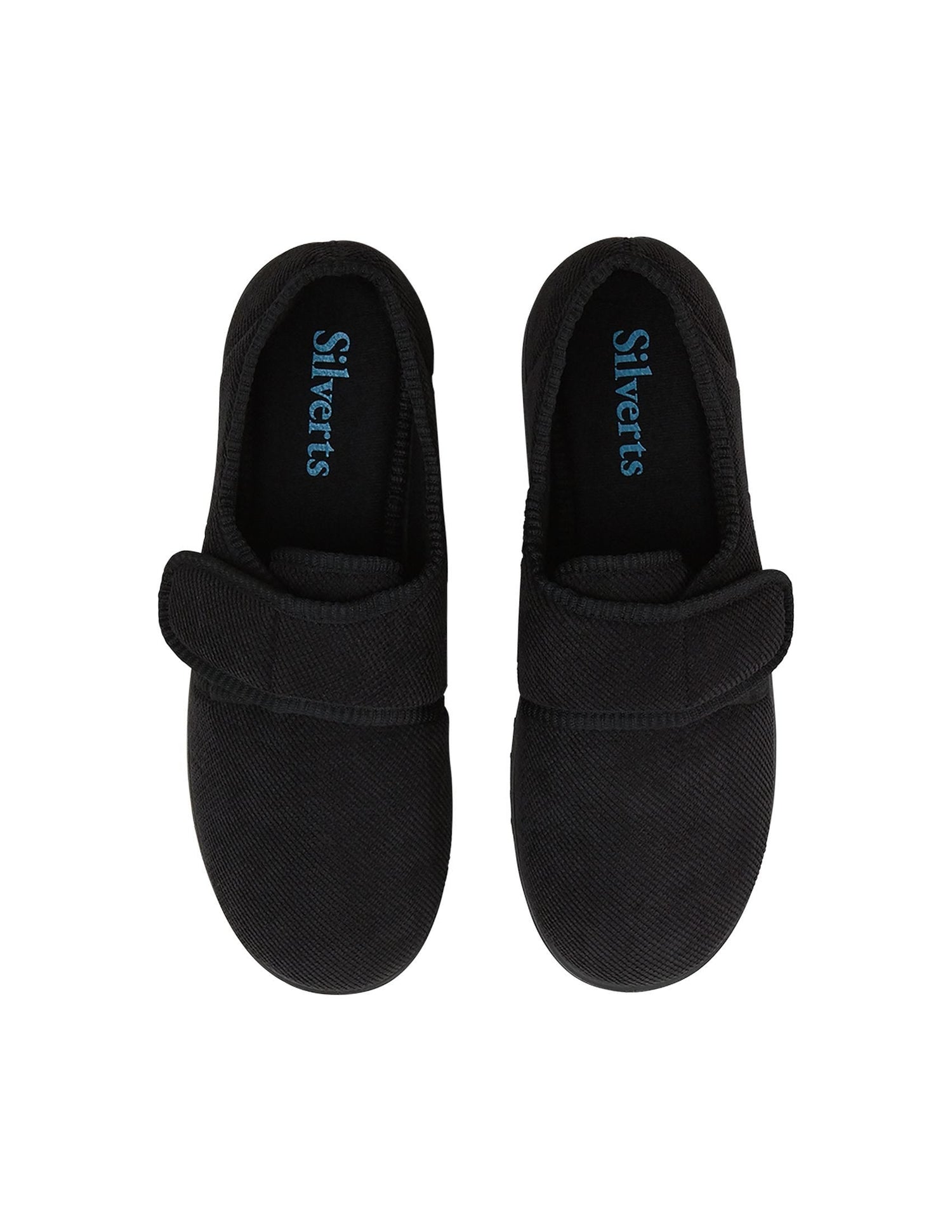 Top of wide black indoor slippers with Velcro closures and removable memory foam insoles