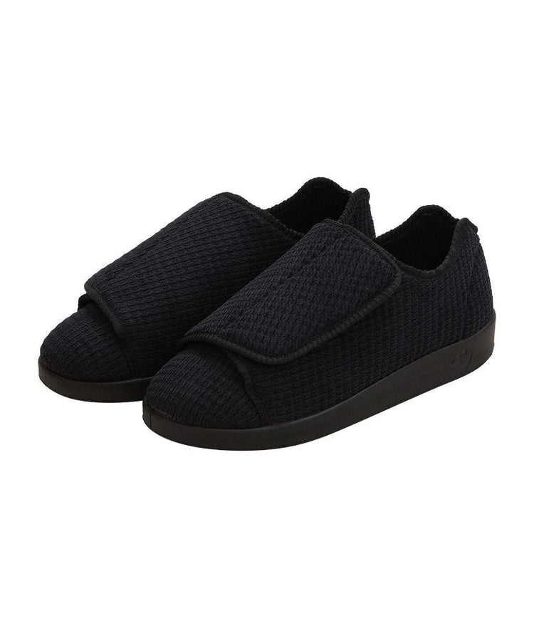 Extra wide soft black non slip indoor slippers that open up completely with large Velcro closures