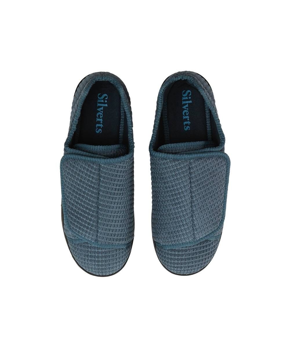 Top of extra wide grey indoor slippers feature huge velcro closures to open slipper completely