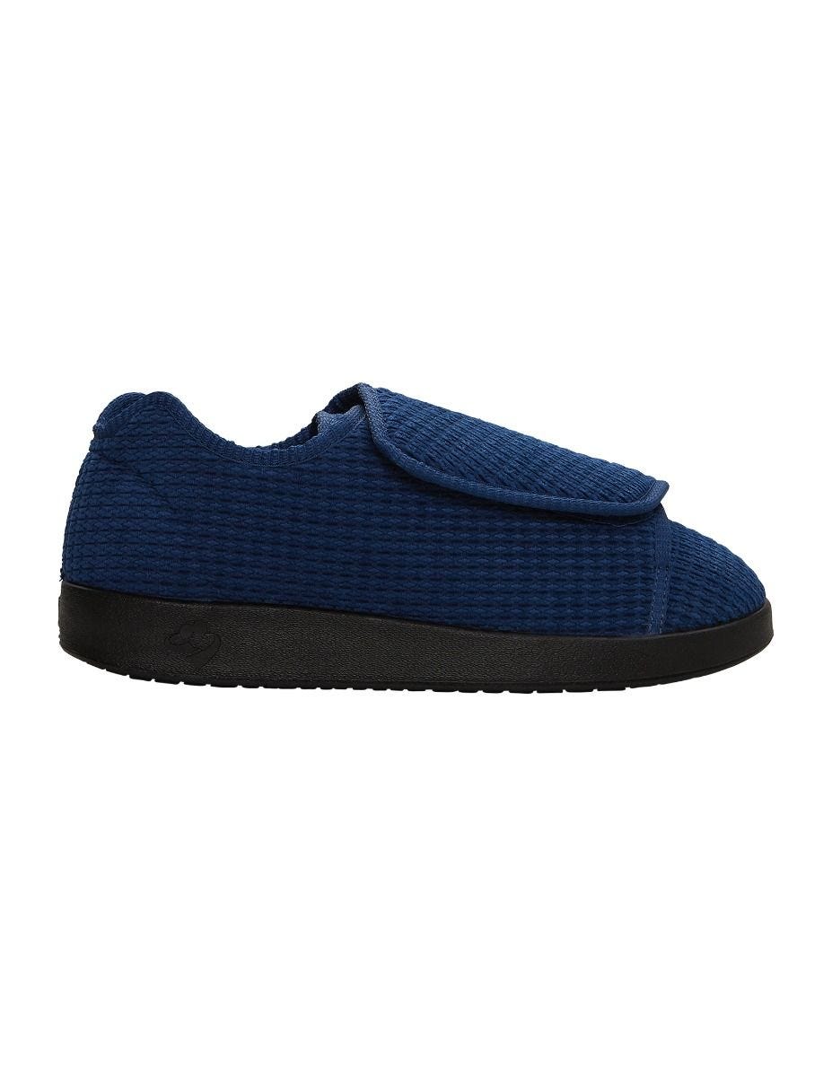 Side of wide navy indoor slippers with large Velcro closures at top for adjustable fit