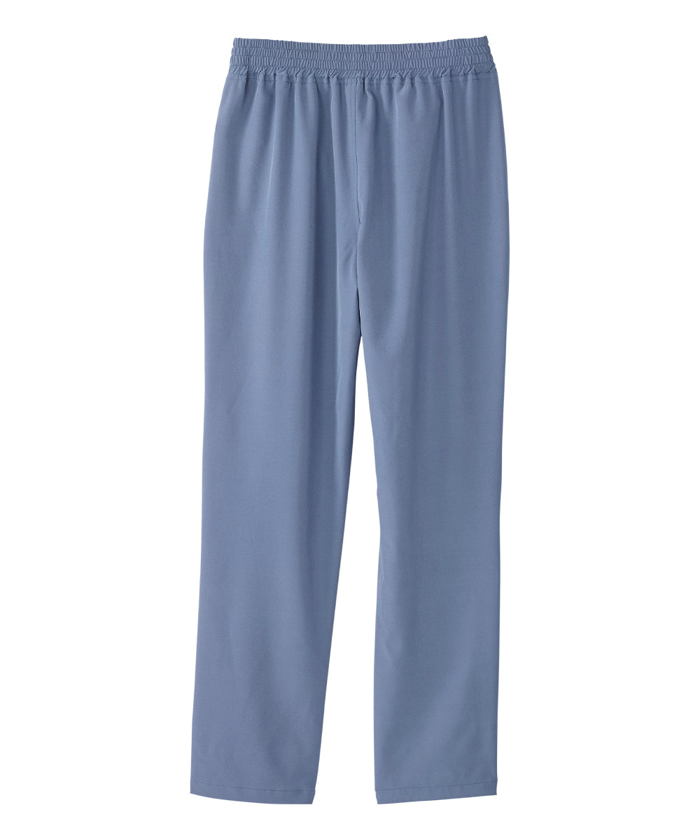 Women’s light blue leisure pants with snaps along the waist and leg openings.