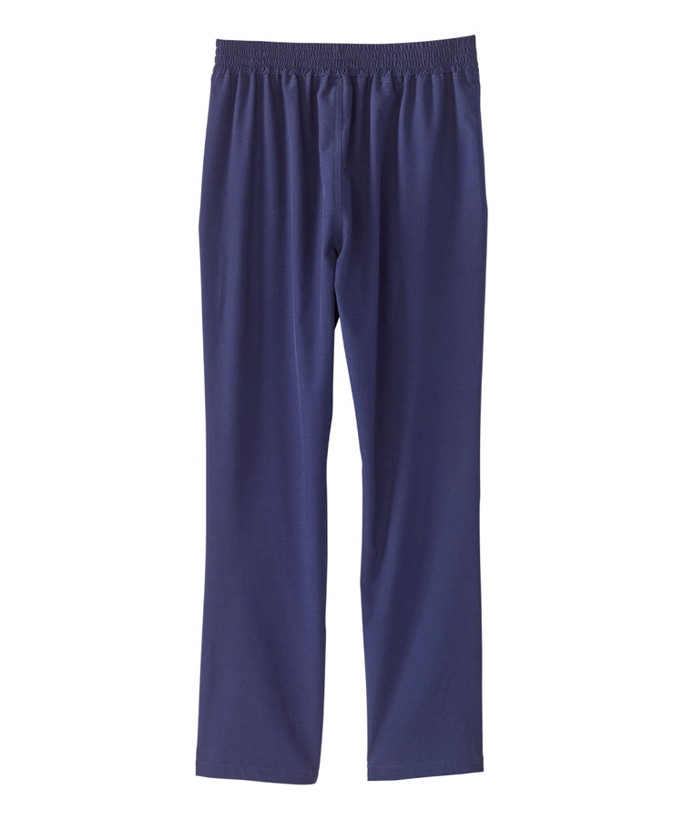 Back of women’s navy blue leisure pants with snaps along the waist and leg openings.