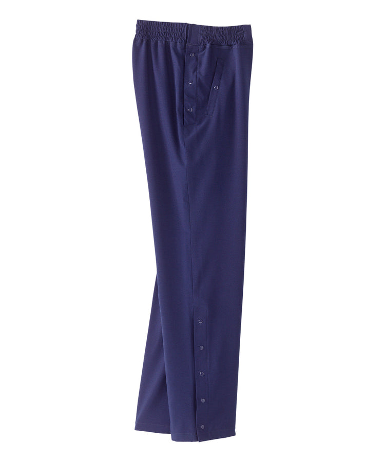 Side of women’s navy blue leisure pants with snaps along the waist and leg openings.