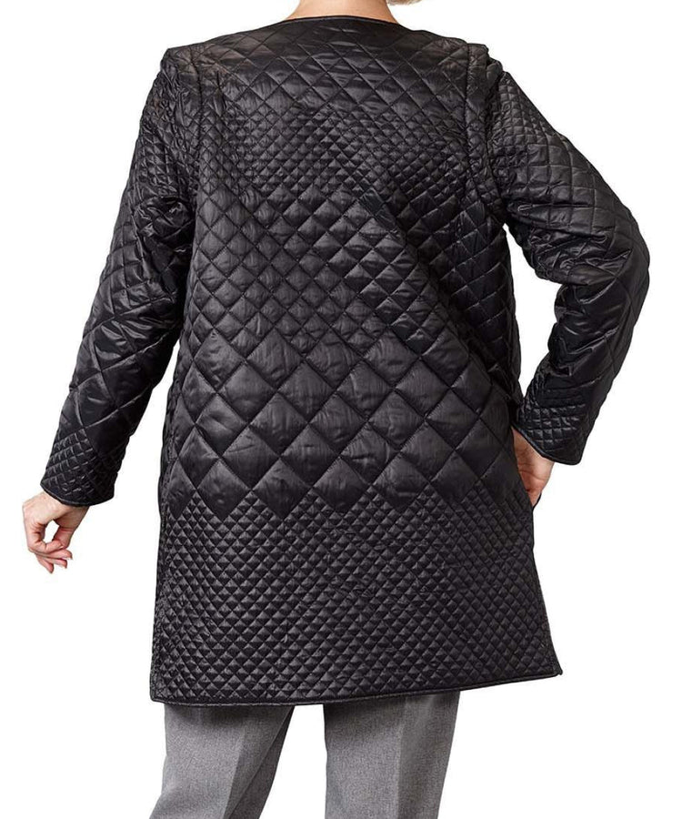Back of women’s black quilted reversible jacket with side seam pockets and removable sleeves.