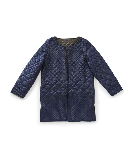 Women’s navy blue quilted reversible jacket with side seam pockets and removable sleeves.