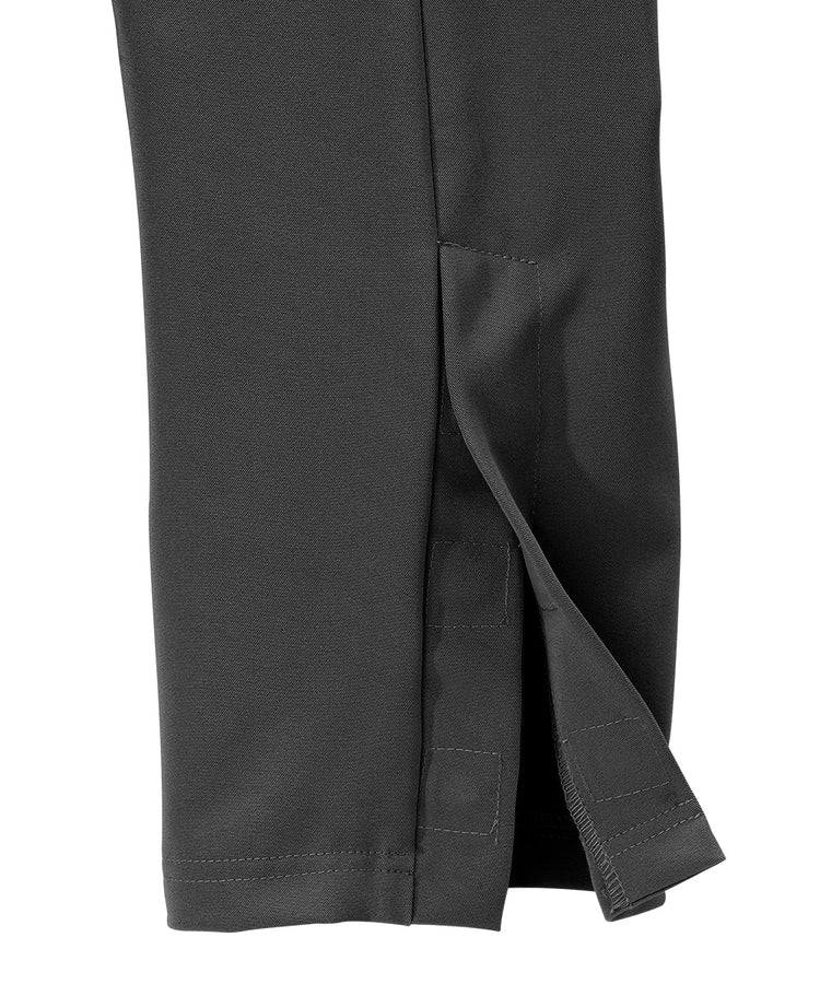 Bottom of women’s black zipper pants with vent on bottom of pants.