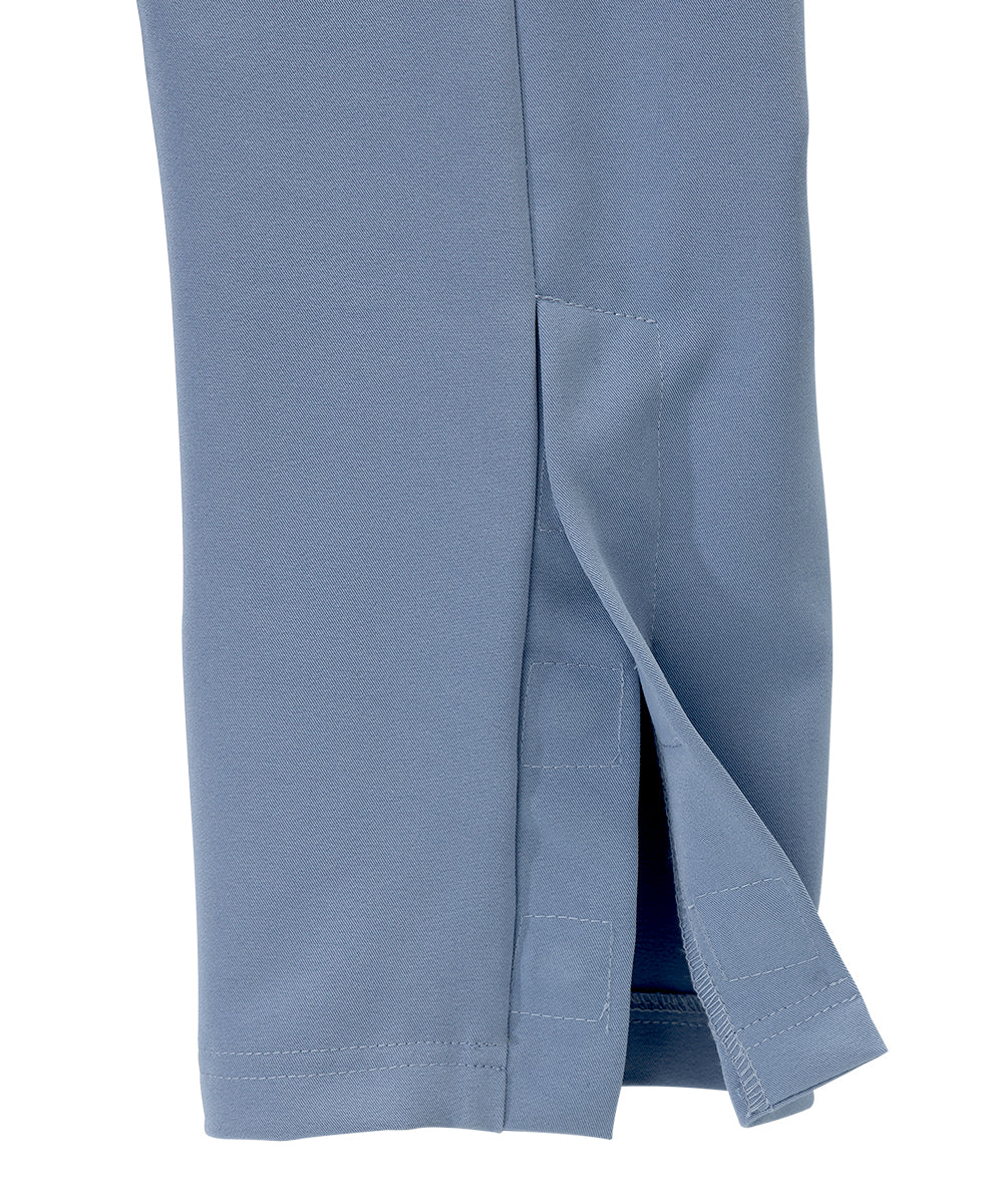 Bottom of women’s light blue zipper pants with vent on bottom of pants.