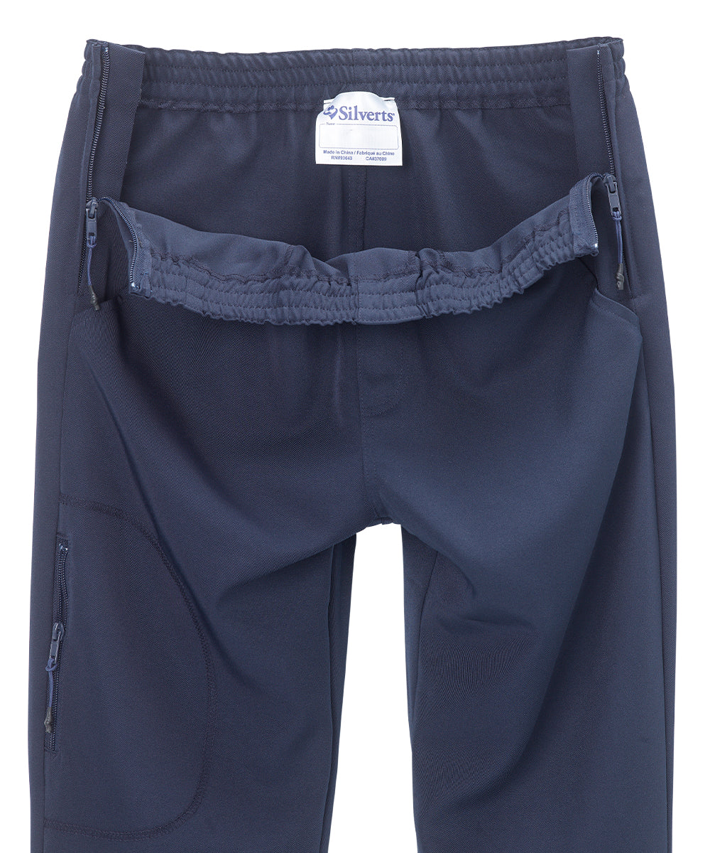 Close up of women’s indigo blue side zipper pants and elastic waist.