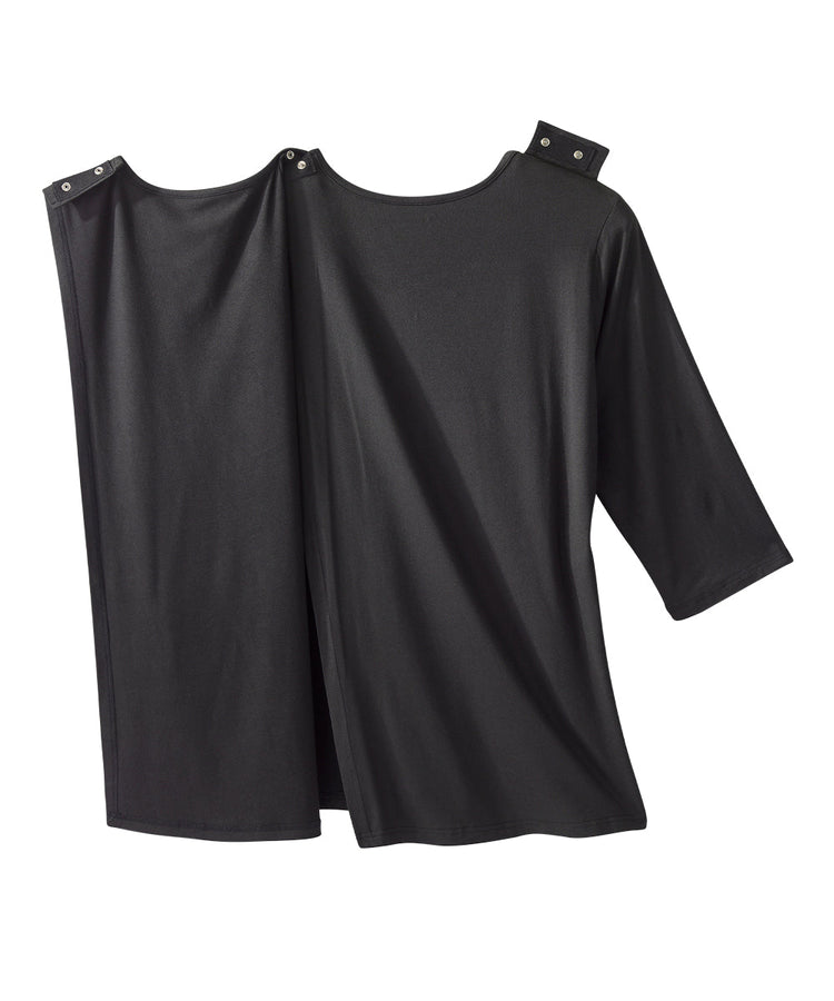 Women’s black elbow length top with back overlap and snap closures on shoulder.
