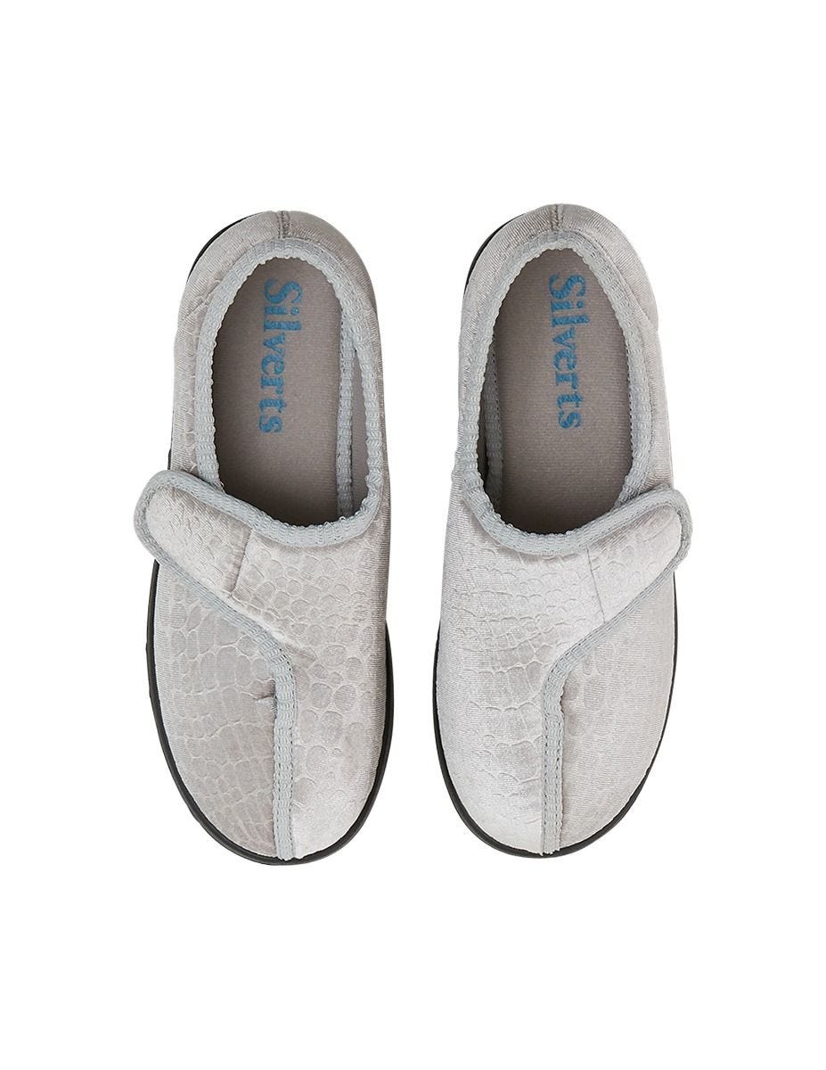 Top of grey slippers with Velcro closures for adjustable fit and removable memory foam insoles