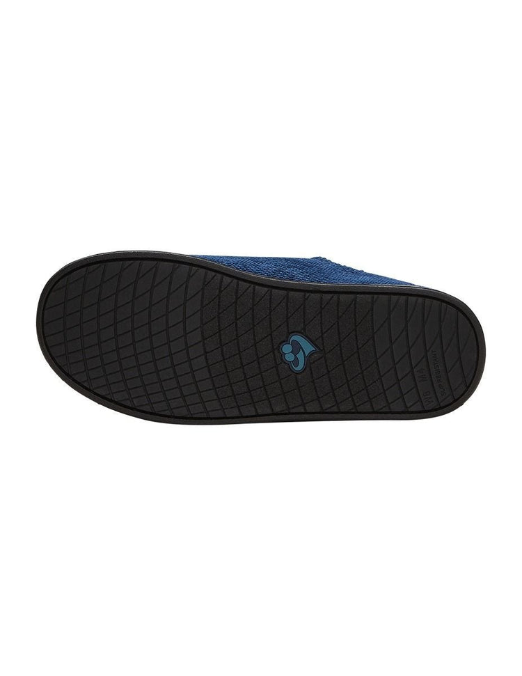 Bottom of women’s navy blue non slip slippers with tread pattern on the bottom.