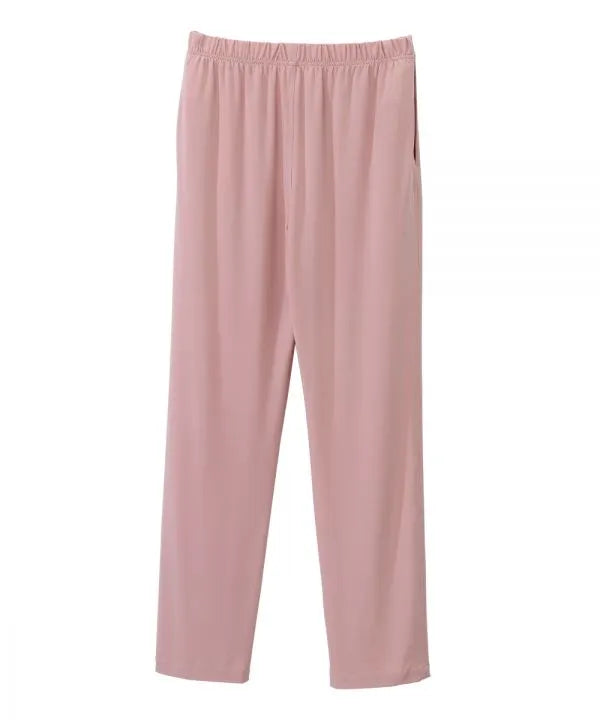 Women’s Dusty Pink pants with side closure, adjustable straps, and loop fasteners on waistband. back view
