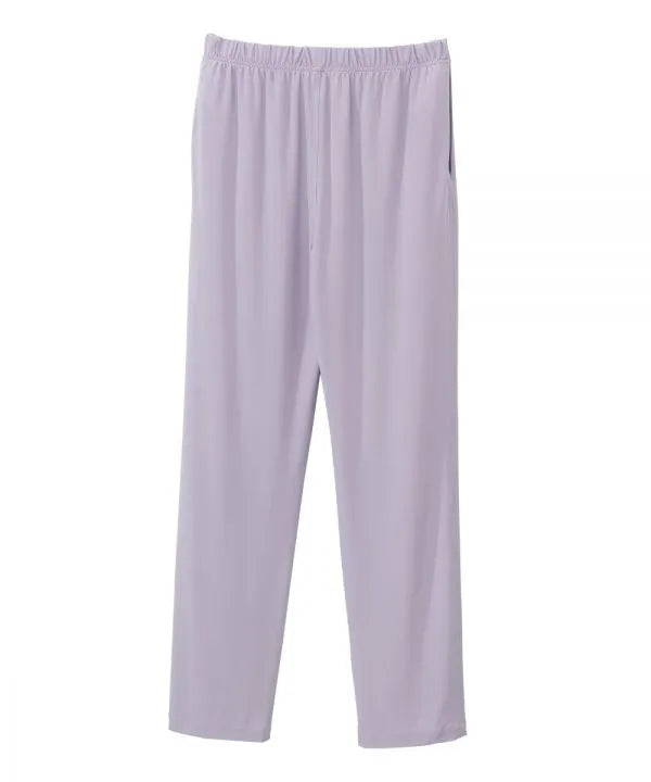 Women’s Lilac pants with side closure, adjustable straps, and loop fasteners on waistband. back view
