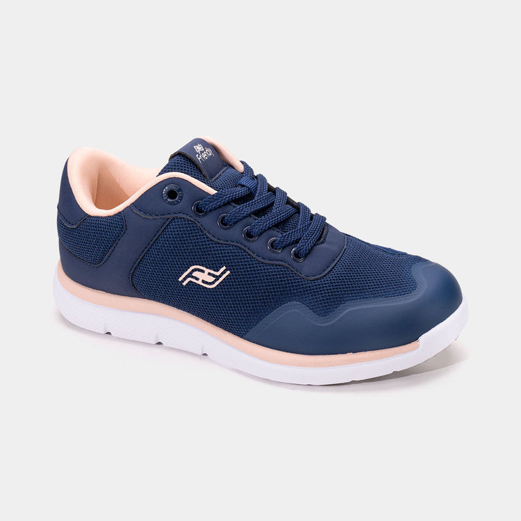 Navy blue women's shoe with white bottom, peach accents, and rear zipper access.
