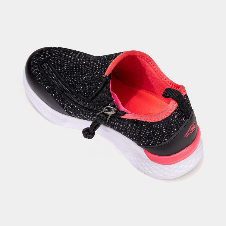 Black kids shoe with white bottom, hot pink accents, and side zipper access.
