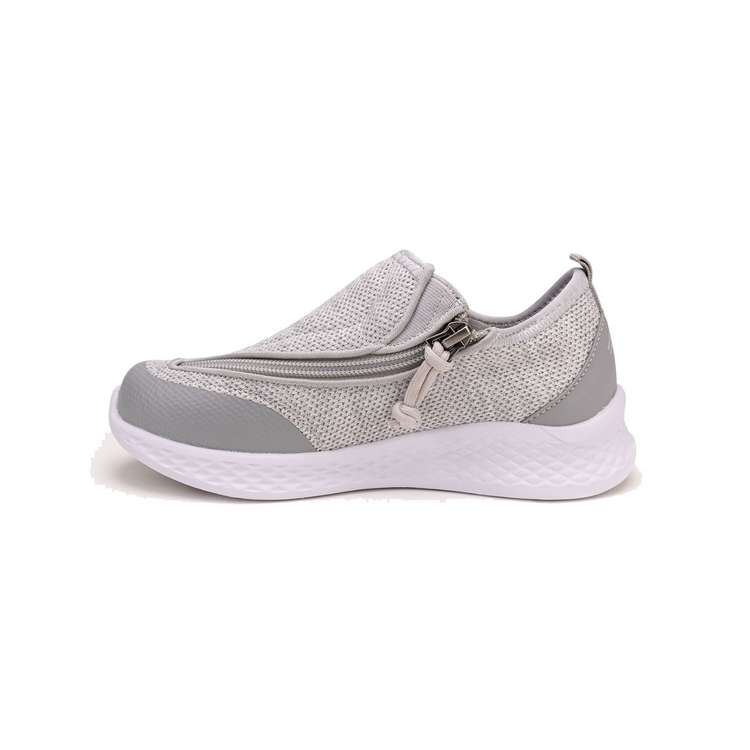 Grey kids shoe with white bottom and side zipper access.