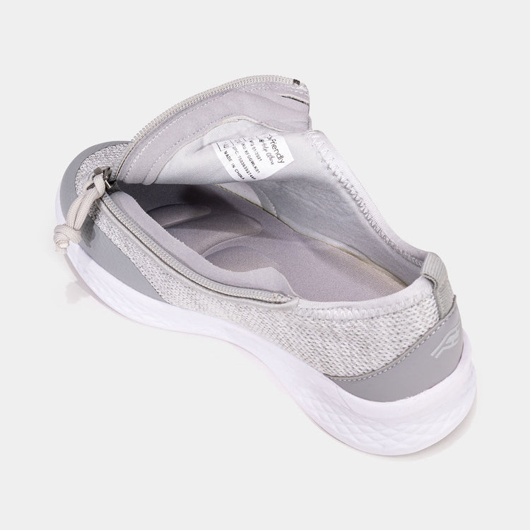 Grey kids shoe unzipped with side zipper access and grey interior padding.