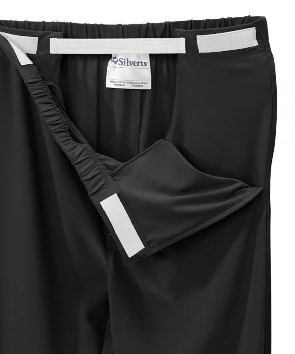 Women’s black pants with side closure, adjustable straps, and loop fasteners on waistband. open view
